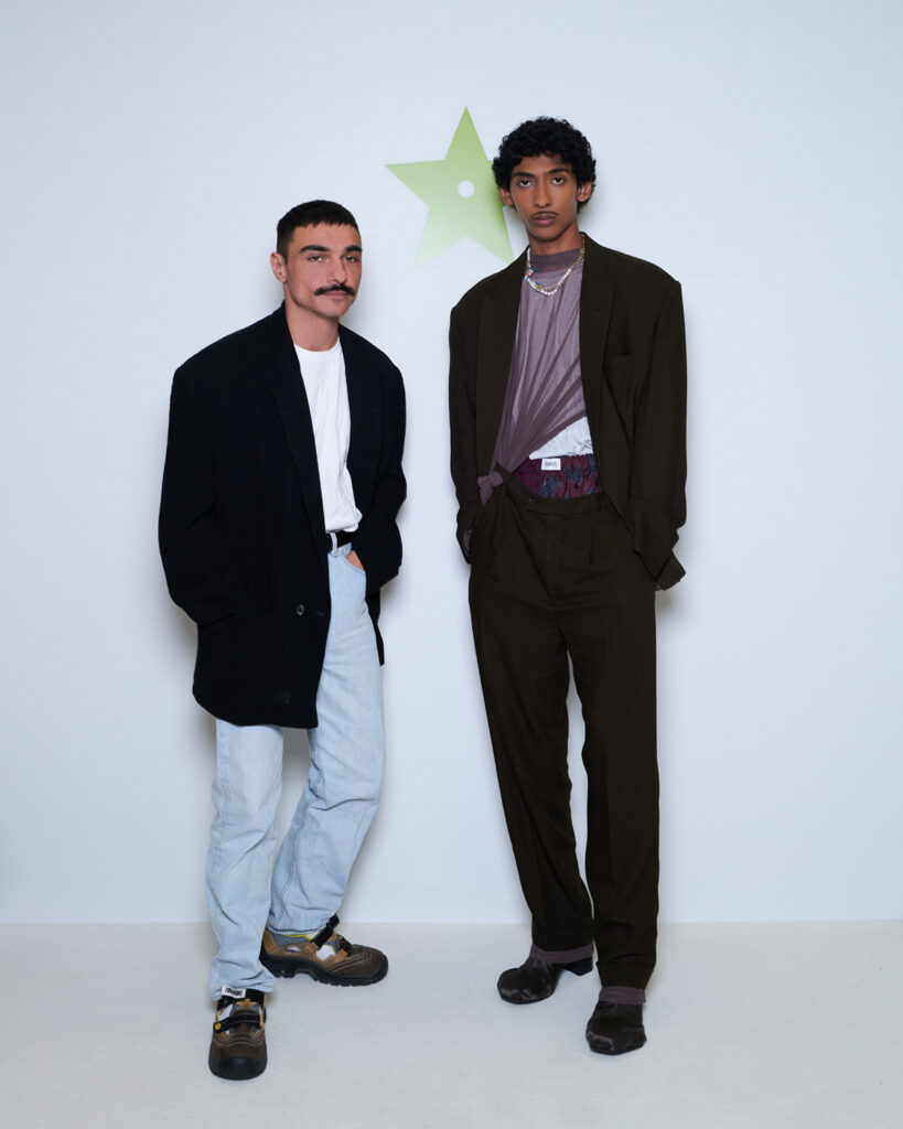 Paris, France, June 7, 2023. Satoshi Kuwata (C), the Japanese designer and  founder of clothing brand Setchu, poses for photo after winning the 2023  LVMH Prize for Young Designers, one of the